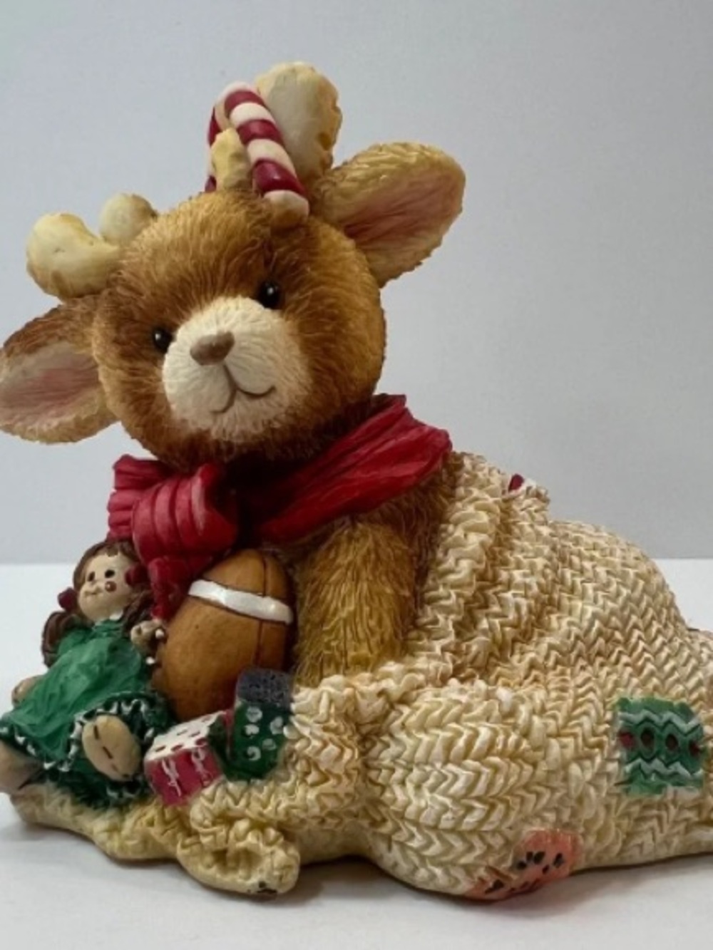 Festive Brown Reindeer Figurine with Red Scarf and Candy Cane